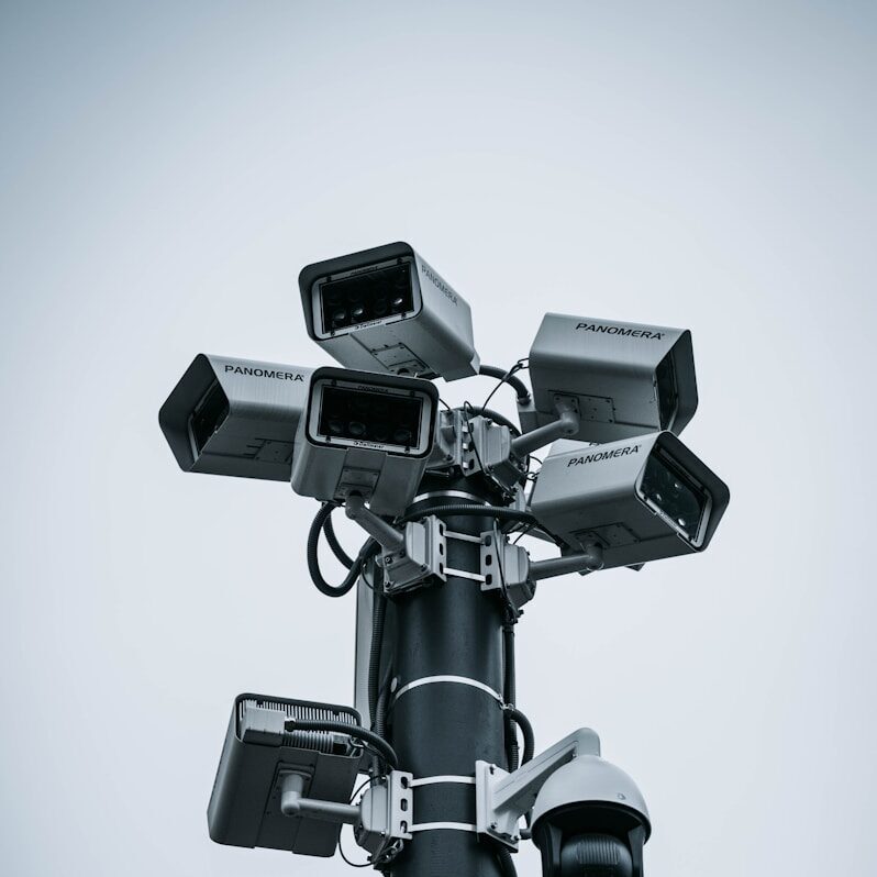 black and gray camera stand
